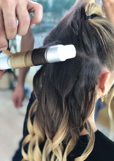 RichardHoliday_2 Models Hair Being Curled With Wand