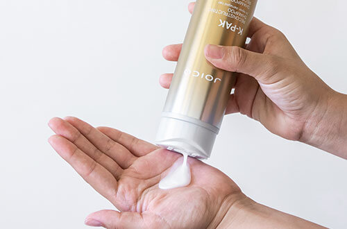 k-pak-reconstructing-shampoo-in-hand K-PAK Reconstructing Shampoo in hand
