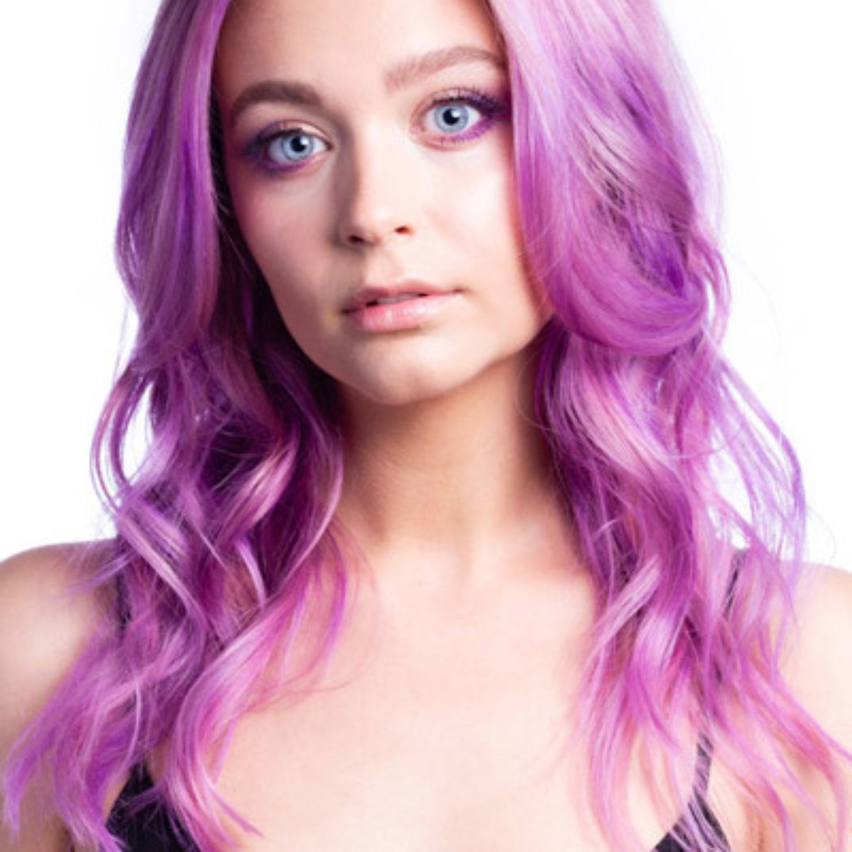 Larisa Love hair model showing purple hair color