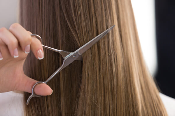 901-price-increase-blog-post2 Womens hair being cut