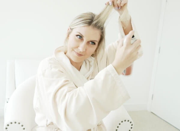 Olivia-Smalley-Weekend-Hair4 Women spraying hair with Dry shampoo