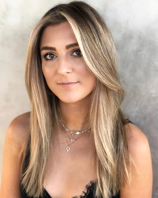 Money-Piece Blonde hair with warm highlights