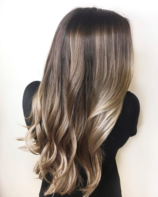 Twilighting-brunette-hair-with-highlights Brunette hair color with blonde lowlights