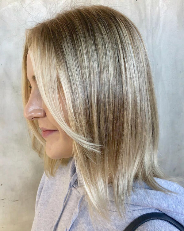 short-blonde-bangs Blonde hair with warm highlights