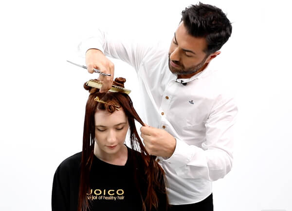 Richard Mannah cutting hair