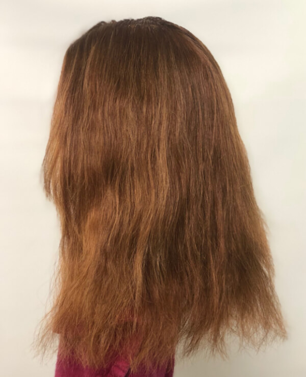 Jill-Buck-NNG-Before Mannequin head with wavy hair