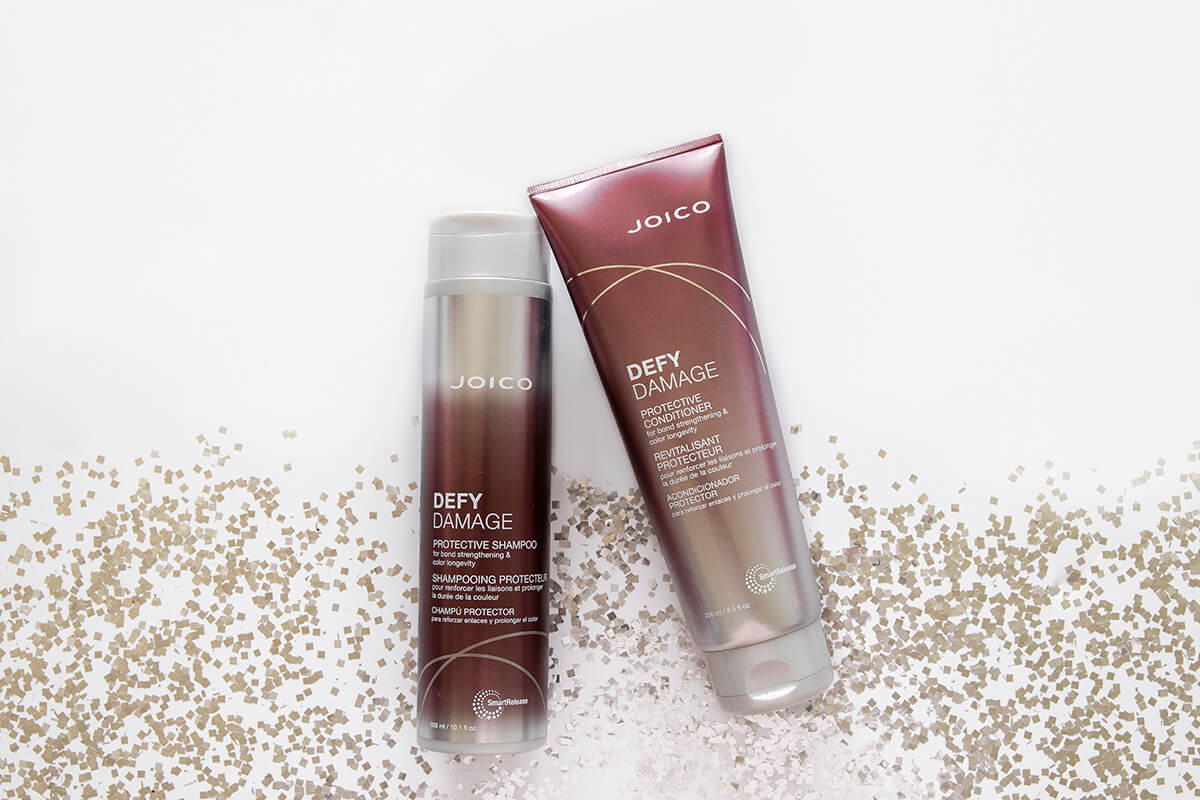 defy-damage Defy Damage Shampoo and Conditioner Bottles