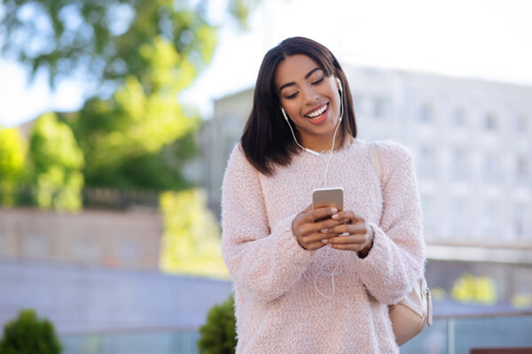 vday-music Women on cellphone