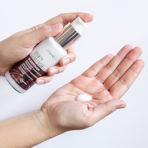 Joico Defy Damage Sleepover product in hand