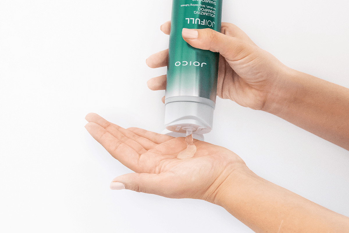 joico-shampoo-in-hand joico Joifull shampoo bottle squeezing into hand
