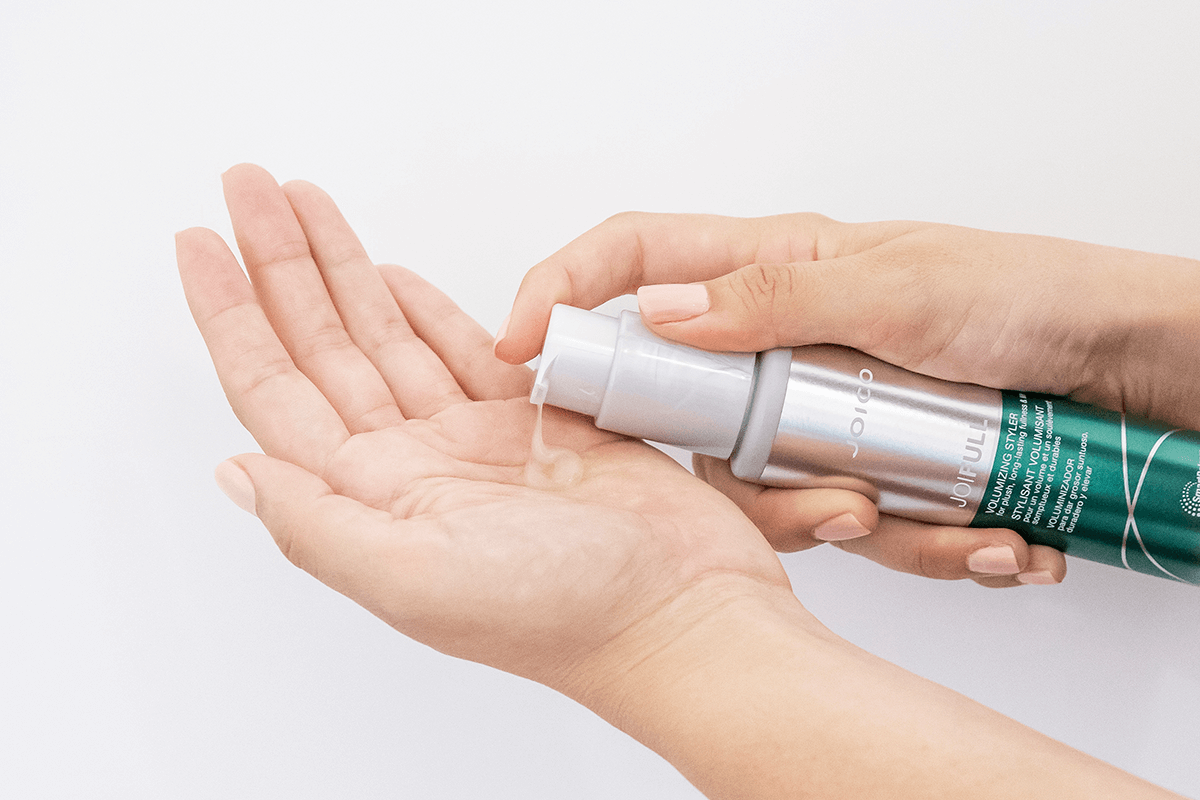 joifull-shield-in-hand Joico Joifull shield bottle squeeing into hand