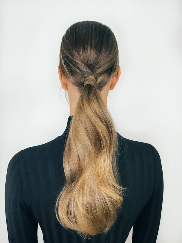 richard-twisted-pony Woman showing the back of her twist ponytail